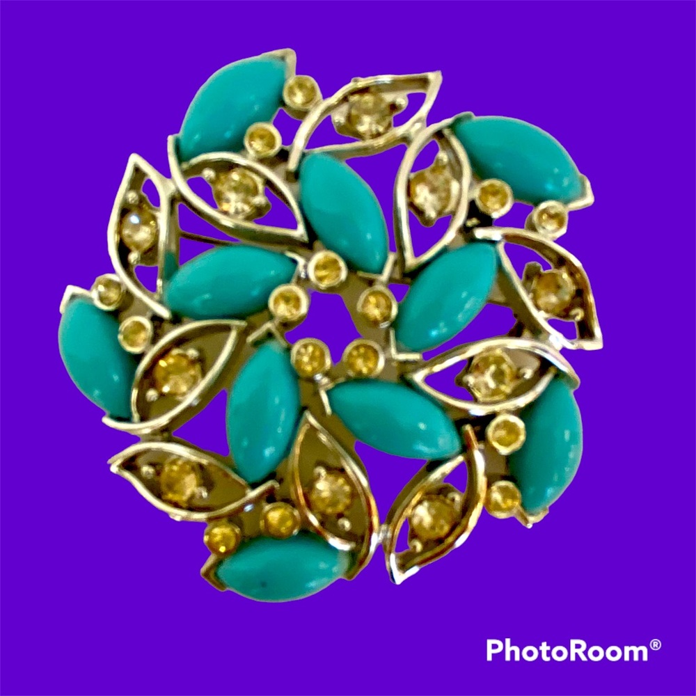 Bogoff Brooch. Blue plastic navettes and clear rhinestones set in silver tone.